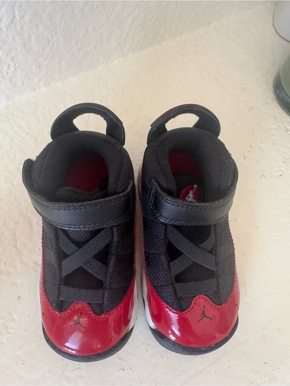 Kids Jordan Black and Red Basketball Sneakers